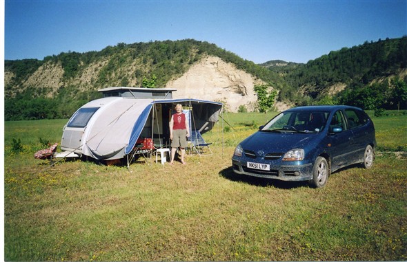 Photo:Betty by the sun awning of our KIP KOMPAKT caravan