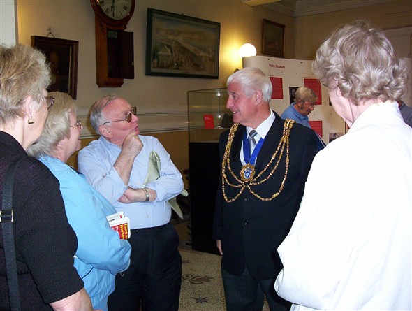 Photo:The Mayor (David Smith)  talking to Bob Cristofoli and other members of our group in the Town Hall foyer.