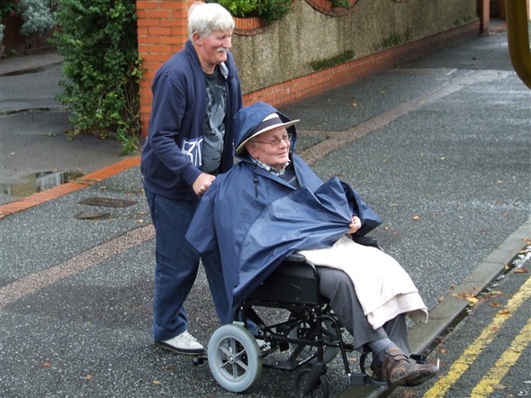 Photo:David wheeling our Vice President Bob out to the coach